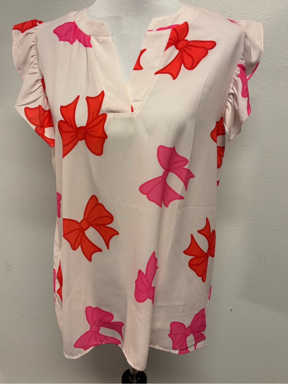 Bibi NWT Women's Pink Bow Print V-Neck Cap Sleeve Top